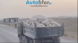 Normadan artıq daş yüklənən “KamAZ” sürücüsü təhlükə yaratdı - VİDEO 