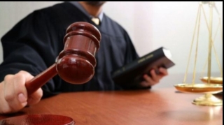 Rüşvətə görə tutulan BNA əməkdaşları hakim qarşısına çıxarılırlar