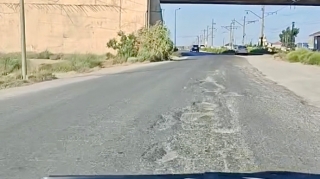 Aşınmış və işıqlandırılmayan bu küçə sürücülərə təhlükə yaradır   - VİDEO