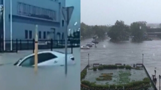 Rusiyada şəhərdə avtomobillər suda üzdü - VİDEO 