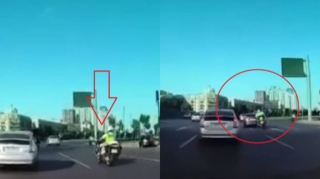 В Баку сотрудник дорожной полиции попал в аварию на мотоцикле  - ВИДЕО