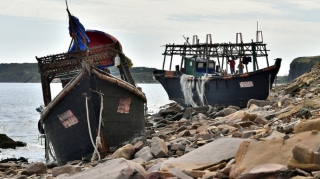 Çində balıqçı qayığı batıb, ölənlər var