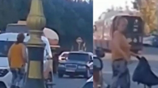 Uşaq arabasıyla yola çıxan qadın sürücünü borclu çıxarmağa çalışdı  - VİDEO