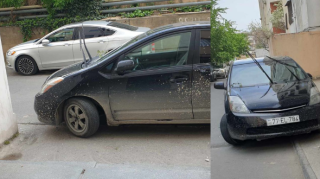 Maşını blokun qarşısına atıb gedən sürücü yolu kəsdi  - FOTO