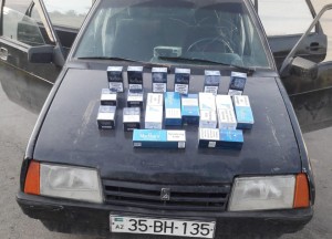 Avtomobildən xeyli miqdarda qanunsuz siqaret aşkarlanıb - FOTO