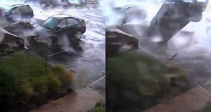 Güclü külək avtomobili havaya qaldırıb yerə çırpdı - VİDEO