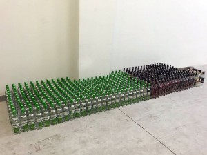 Külli miqdarda aksiz markası olmayan spirtli içkilər aşkarlanıb                      - Video