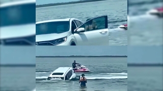 Avtomobilini dənizin sahilində park edərkən suda batırdı   - VİDEO