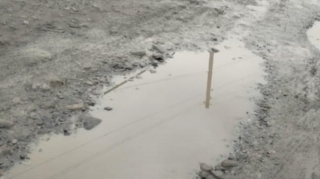 Oğuzda iki kəndi birləşdirən yol bərbad vəziyyətə düşüb 