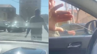 В Баку мужчина разгуливал посреди дороги, препятствуя движению транспорта    - ВИДЕО