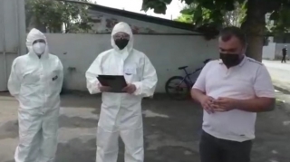 Avtomobilini təmir məntəqəsinə  aparan koronavirus xəstəsinə cinayət işi açıldı  - FOTO