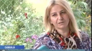 Şəhid ailələrindən çəkiliş üçün pul istəyən qadın danışdı - VİDEO