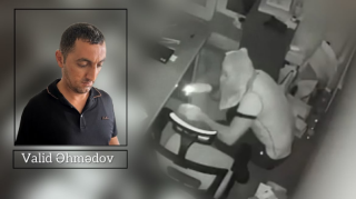 В Ширване вор в маске и перчатках вынес из магазина приличную сумму: кадры момента кражи  - ВИДЕО