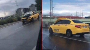 Kapotu açıq vəziyyətdə hərəkət edən taksi - VİDEO