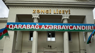 Liseyin yaxınlığında ağac yandı, məktəbin elektrik xətləri zərər gördü 