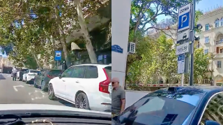 Dayanacaqda yer tapa bilməyən taksi sürücüsü parkinqə üz tutdu   - VİDEO